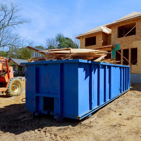 construction dumpsters can hold a wide variety of materials, including debris from demolition projects, roofing materials, lumber, and concrete